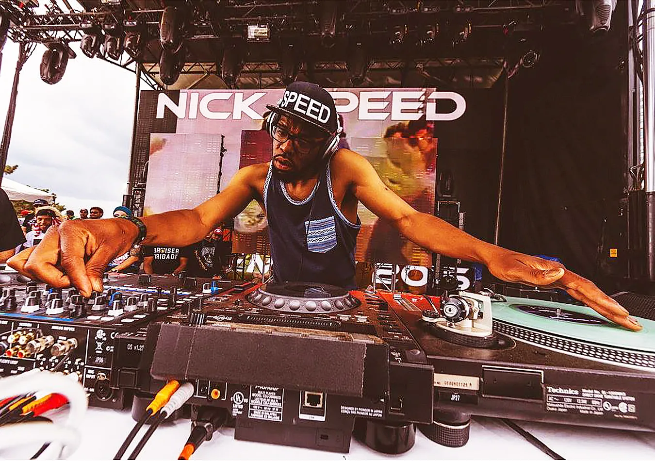 Nick Speed at a DJ table
